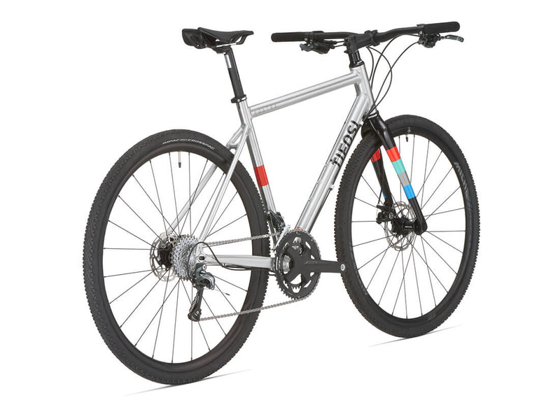 Load image into Gallery viewer, Tifosi Rostra Disc Flat Bar Tiagra Hybrid Mechanical Bike in Chrome
